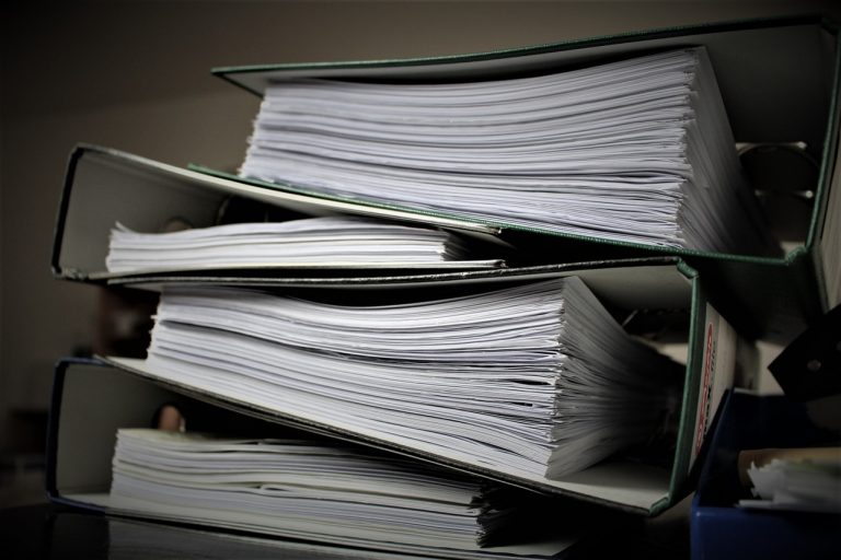 a pile of post-move paperwork