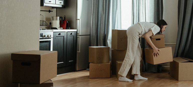 Two people unpacking and settling in