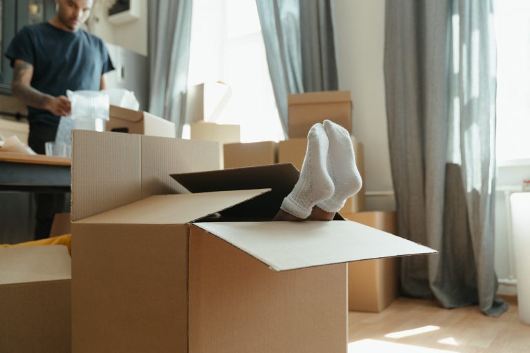 a person in the cardboard box