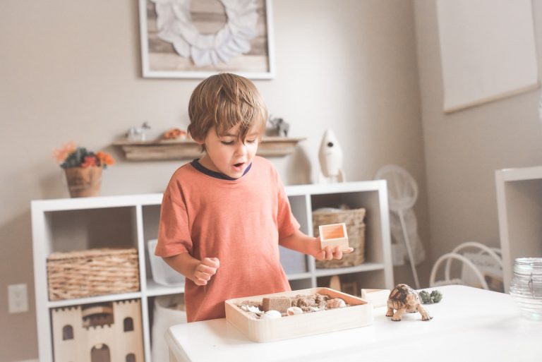 Toddler playing in his house