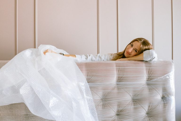 A woman packing her sofa