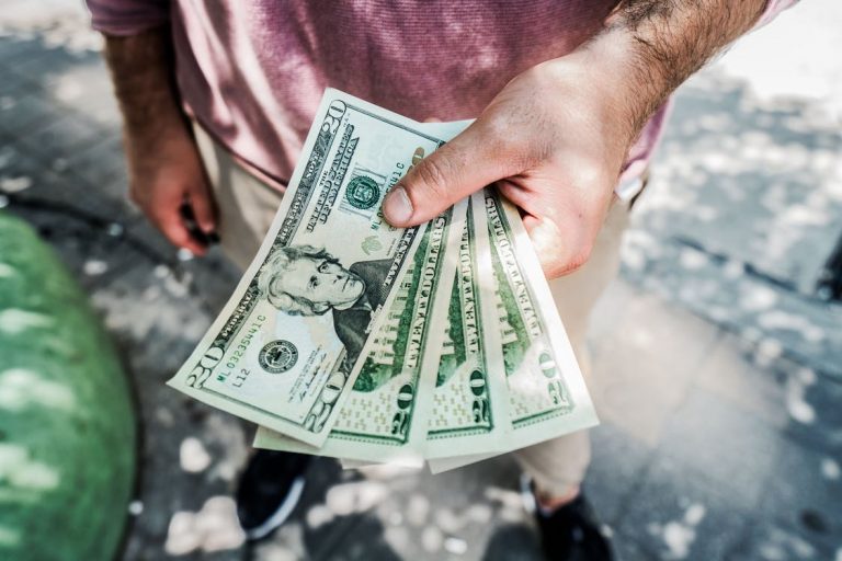 A person holding money