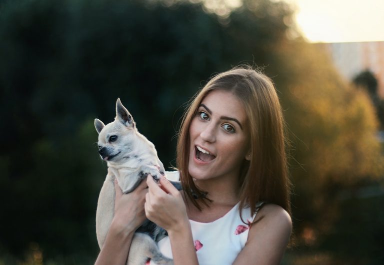 a woman showing how to take care of pets on moving day