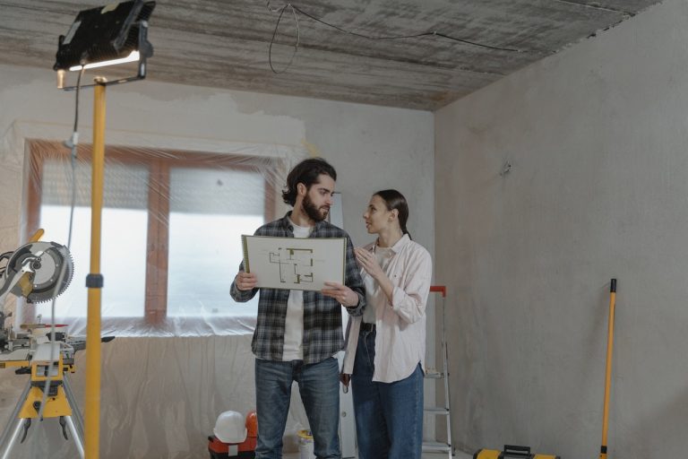 a couple discussing whether to rent storage during home renovation