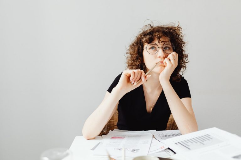 Woman thinking about the reasons to move to Brockville in 2023