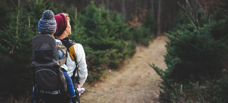 A woman and baby hiking and discovering Mississippi Mills after moving