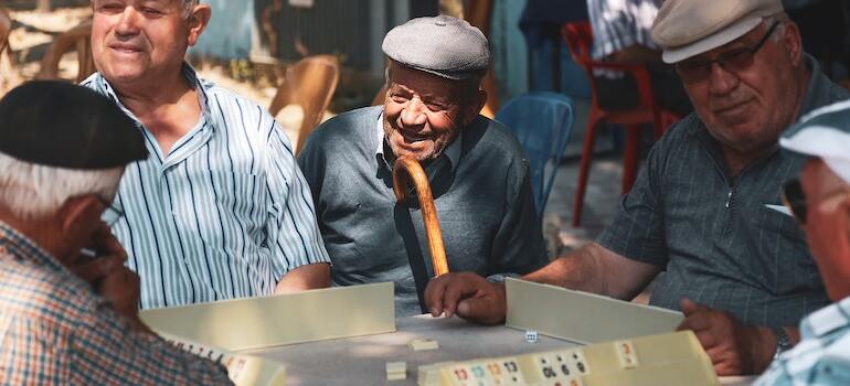 One of your parents playing a game after you managed to help your elderly parents move to Ottawa