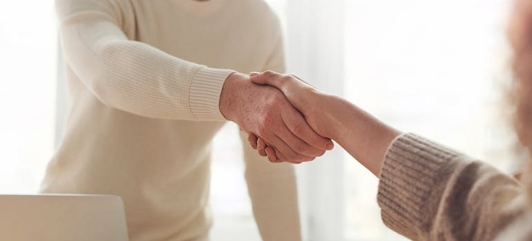 Two people shaking hands