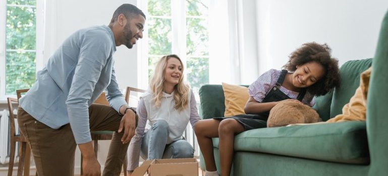 Young family meeting their new pet after settling into one of safest Ottawa neighborhoods to move to