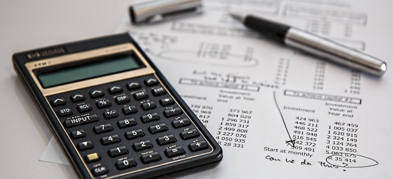 a calculator and a pen