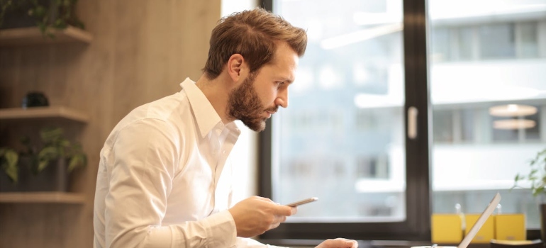 a businessman thinking about finding the best coworking places in Ottawa