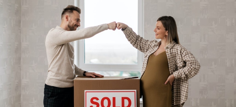 a woman and a man talking after the move