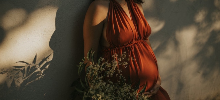 a pregnant woman posing