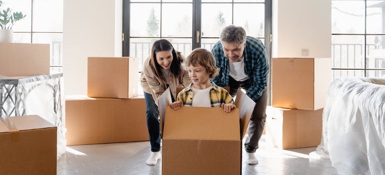 A family having fun after the big move