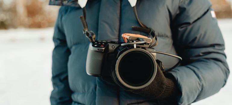 a man holding a camera