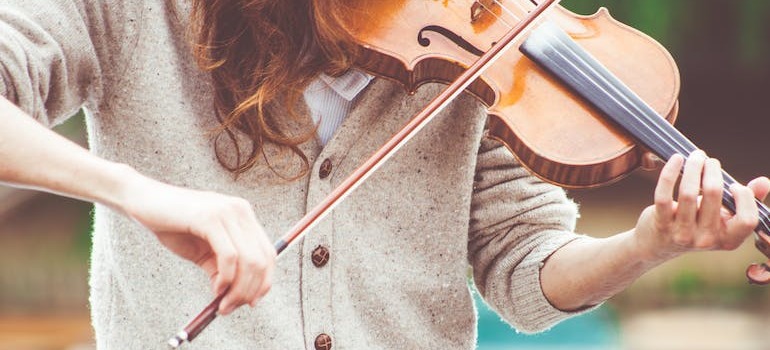 A woman playing the violin