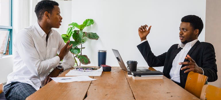 two roommates talking about finances for their Ottawa home