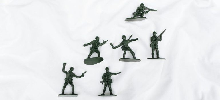 Little black action figures of fighters
