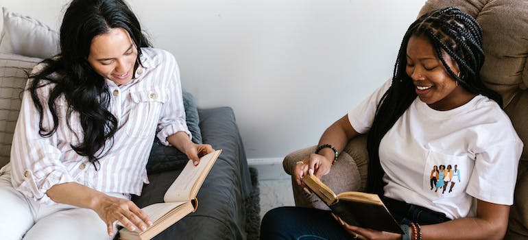 two women reading books