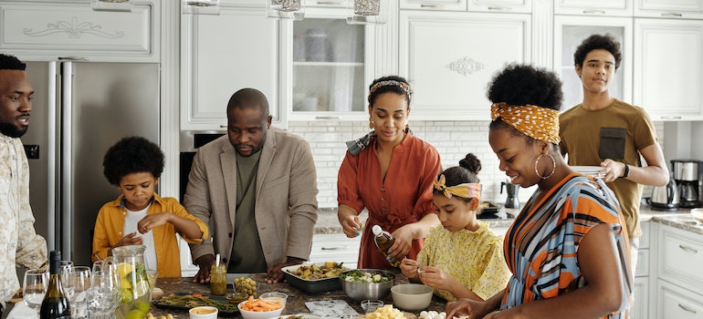 Family enjoying a meal in one of the one of the safest Ottawa neighborhoods to move to