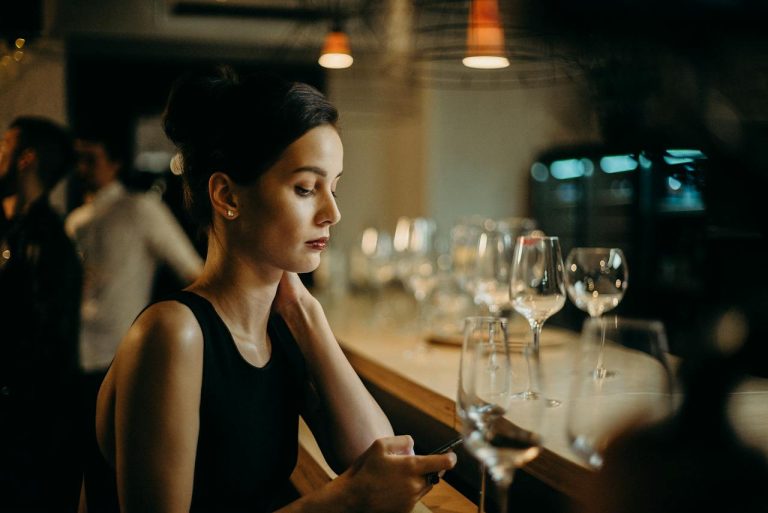 A woman researching popular Ottawa neighborhoods for singles on her phone