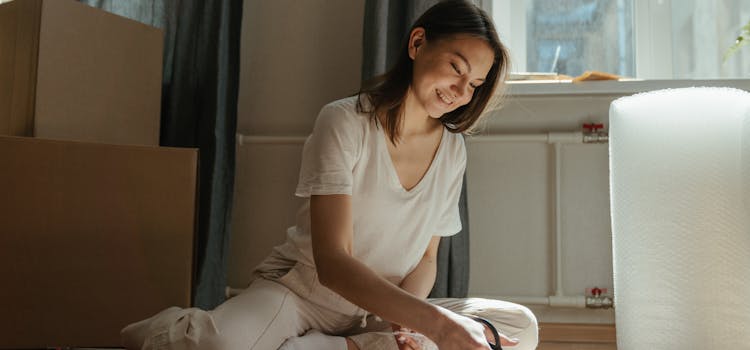 A woman about to pack her gaming equipment