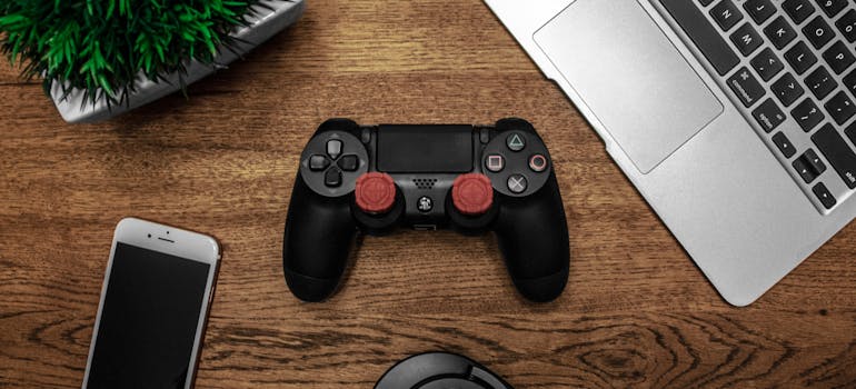 a joystick on a table after relocate your gaming room with ease