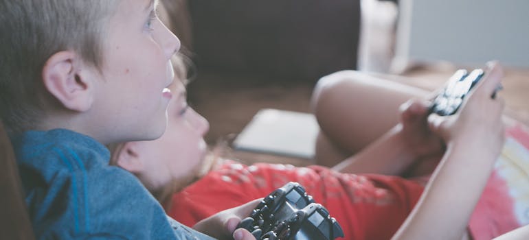 kids playing a game on console