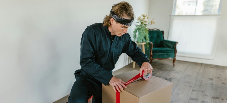 a man holding a box