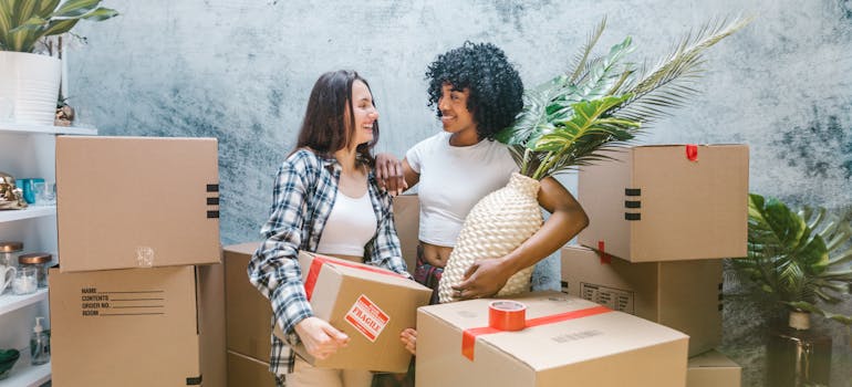 two women discussing questions to ask your ottawa movers