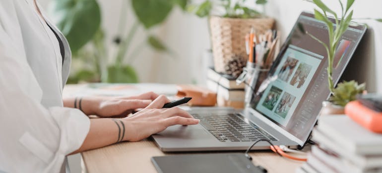 a woman using laptop and searching about highest paying jobs in Ottawa