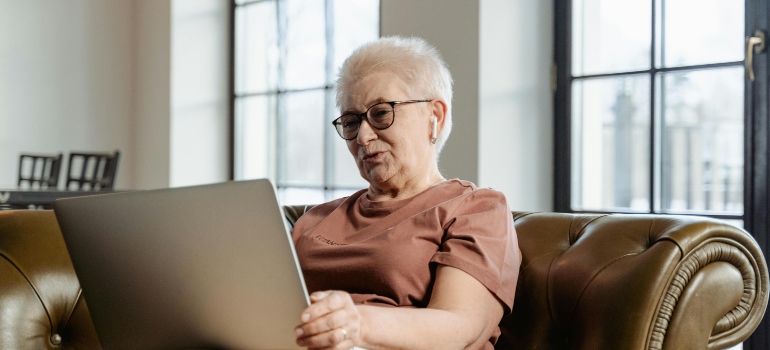 older Woman reading tips for seniors planning to move to Ottawa