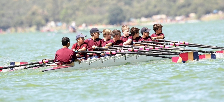 People Riding A Boat
