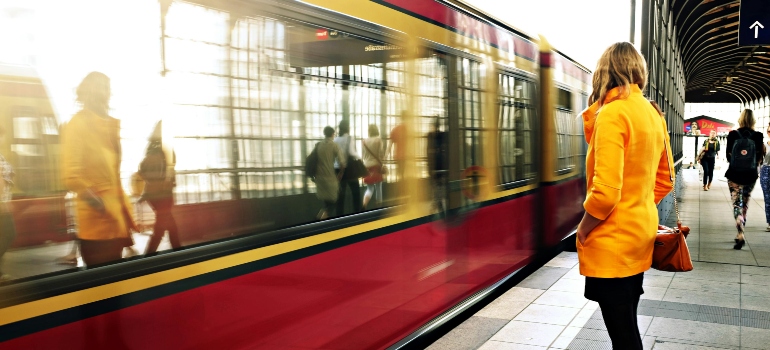 woman using a train for moving from Brockville to Carleton Place