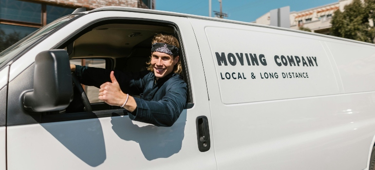 Man in a moving company van.