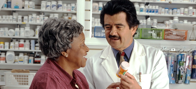 Picture of a senior talking to a doctor after retiring in Kanata
