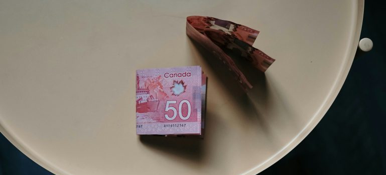 Canadian dollars on a table