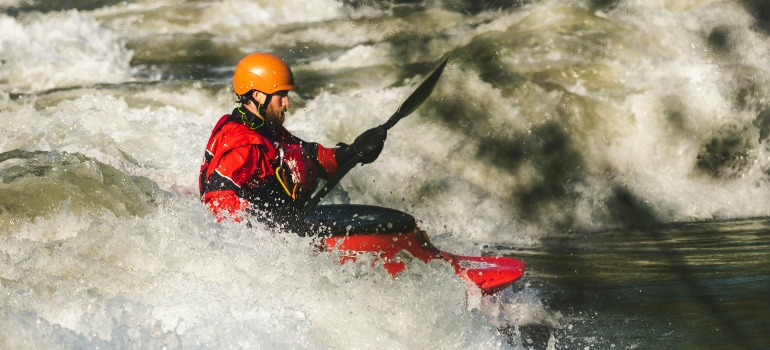 Man on Red Watercraft as one of the Things to do on the Ottawa river