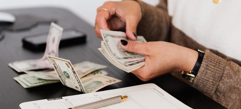A person budgeting before moving to Ottawa for work