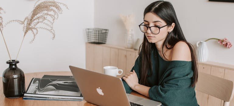 A woman sitting at a table and exploring jobs 