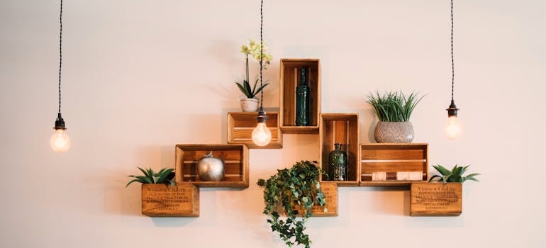 Brown wooden shelves on a white wall.