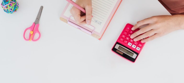 person calculating costs
