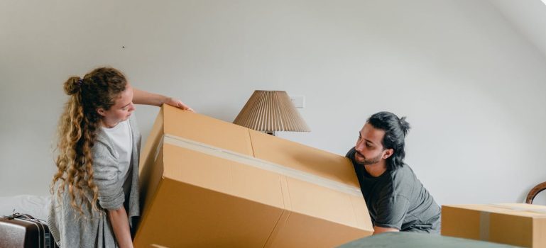 a couple trying to Pack in a Day for Your Ottawa Move
