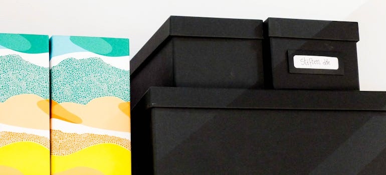 Black boxes stacked up on top of each other.