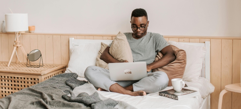 A man learning how to find a remote job. 