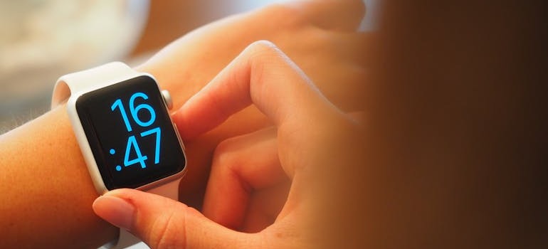 A person checking the time