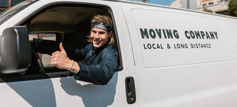 A mover inside a van going over a day in the life of a professional mover