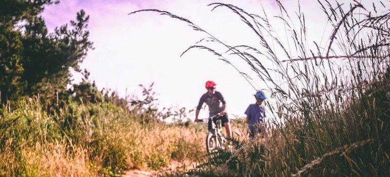 two people riding bikes