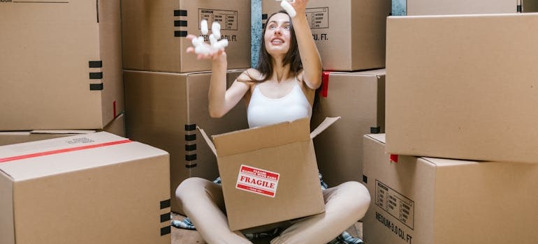 A woman preparing before moving to a bigger home in Ottawa