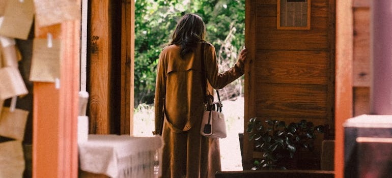 A woman leaving her home